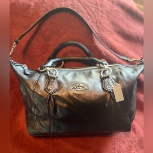 Black leather coach purse.